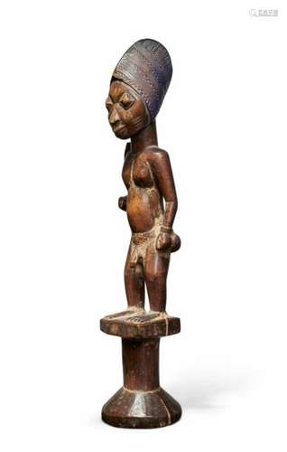 AN IGBOMINA YORUBA FIGURE, FOR THE CULT OF ESHU, OGO ELEGBA