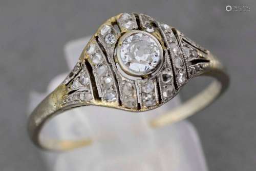 1920 gold ring set with a central diamond shoulder…