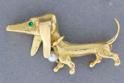Gold brooch styling a dachshund, the eye is set wi…