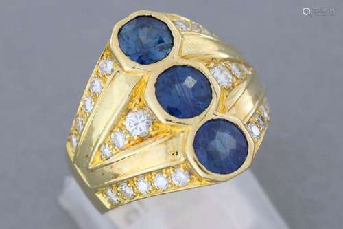 Gold ring set with three sapphires set with brilli…