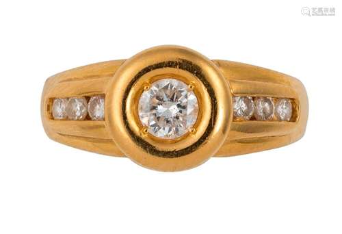 Gold ring centered with a brilliant of about 0.25 …