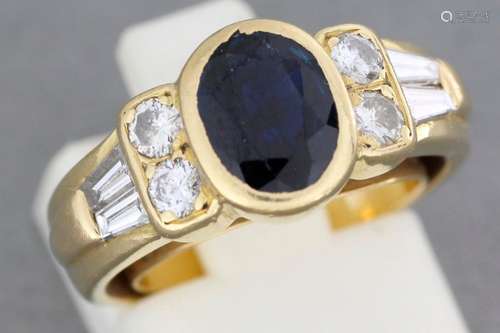 Gold ring set with a sapphire with diamonds and di…