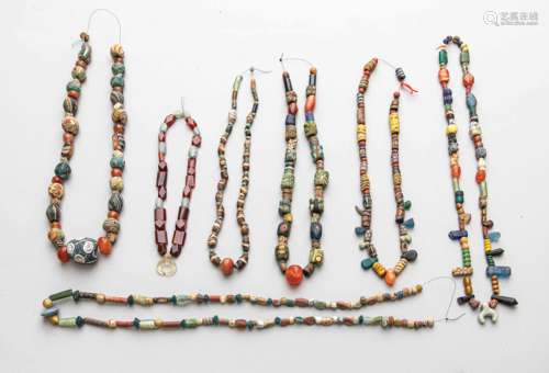 7 antic stone, glass and ceramic necklaces