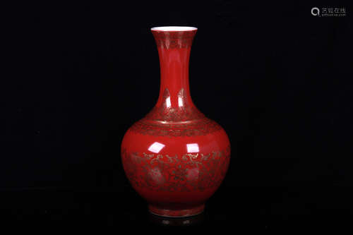 A IRON-RED AND GIL-DECORATED VASE