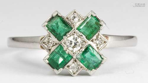 Emerald, diamond, platinum ring