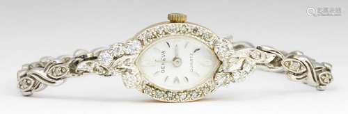 Lady's Geneva diamond, white gold and metal wristwatch