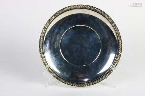 Sterling plate, the dish form finished with a gadroon