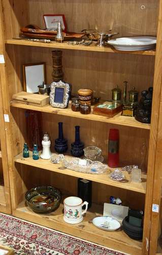 Four shelves of decorative art