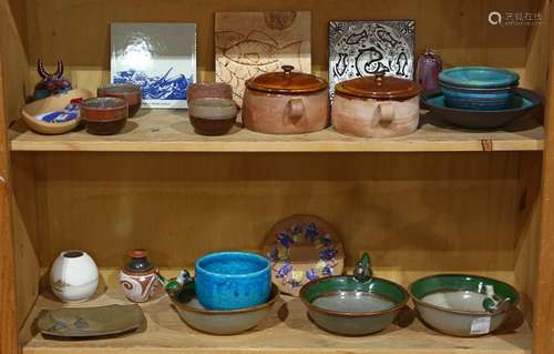 Two shelves of pottery