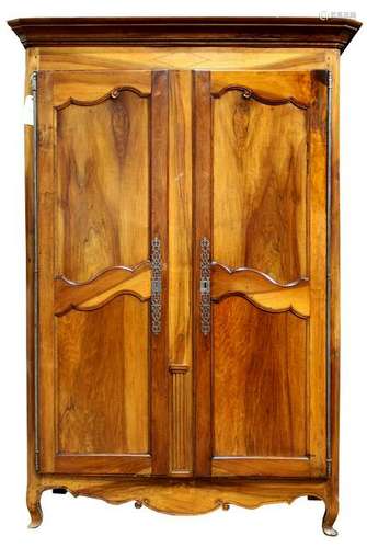 A Louis XV style walnut armoire