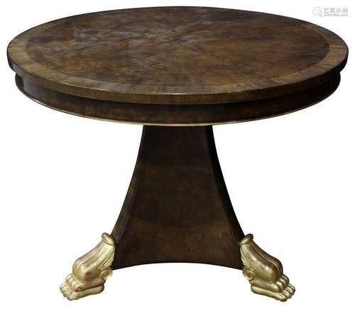 An Empire style walnut center table