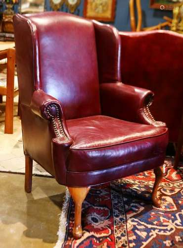 Chippendale style red leather wing back chair