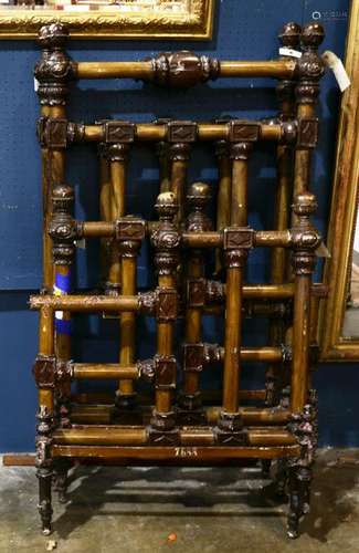 A Victorian faux grain painted bedframe circa 1860