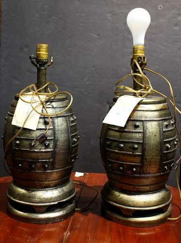 Pair of Archaistic style gilt drum form lamps