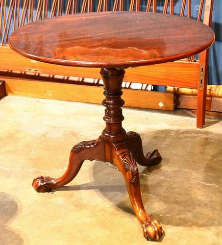 A Chippendale style solid mahogany tripod tea table