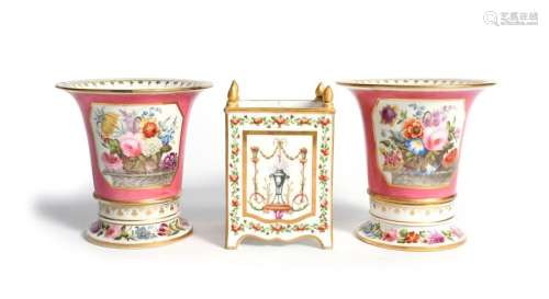 A pair of Paris porcelain câchepots and stands 19t…