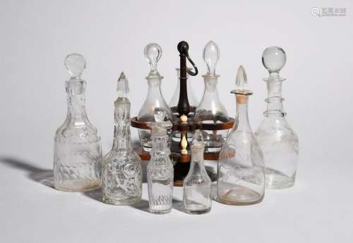 Λ A condiment stand and three bottles 19th century…