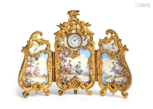 A French gilt metal and enamel clock, in the Rococ…
