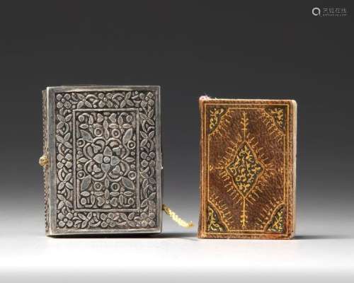 AN ILLUMINTATED MINIATURE OTTOMAN QURAN AND SILVER…