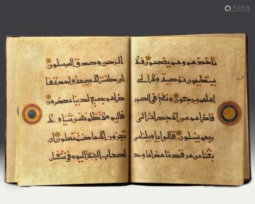 A LEATHER BOUND BOOK WITH ISLAMIC TRANSCRIPTS