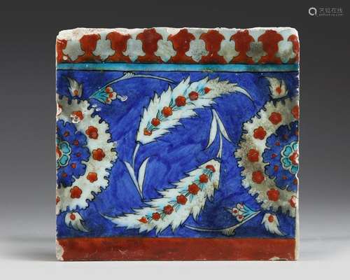 AN IZNIK POTTERY TILE