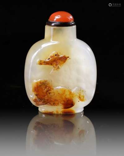 A CHINESE SHADOW AGATE 'BUDDHIST LION' SNUFF BOTTL…