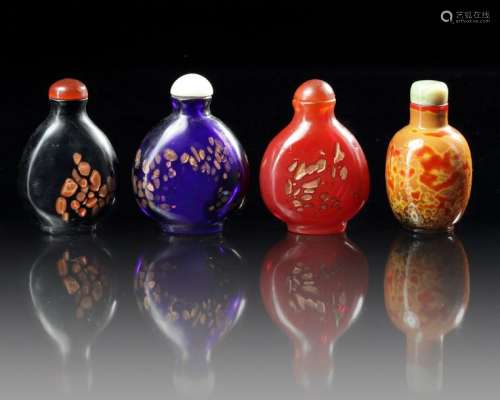 A GROUP OF FOUR CHINESE PEKING GLASS SNUFF BOTTLES