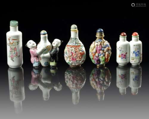 A GROUP OF FIVE CHINESE FAMILLE ROSE SNUFF BOTTLES