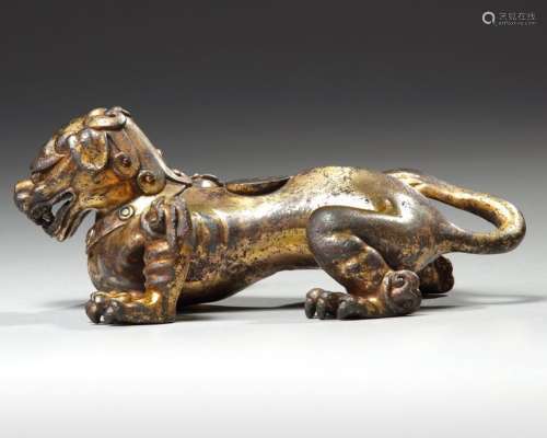 A CHINESE GILT BRONZE FIGURE OF A MYTHICAL BEAST