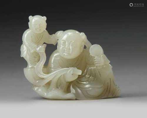 A CHINESE PALE JADE CARVING OF A MAN AND A BOY