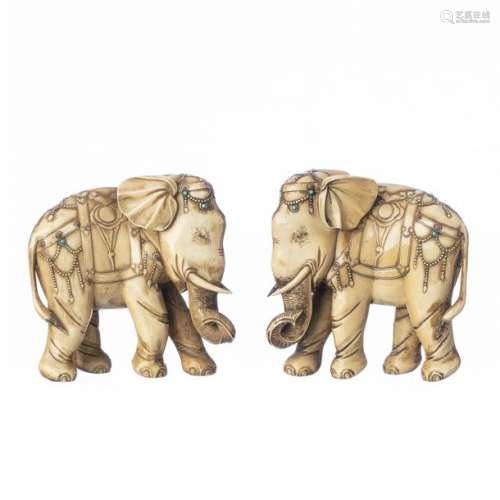Pair of elephants with coral and stone application…