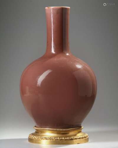 A CHINESE PLUM GLAZED VASE