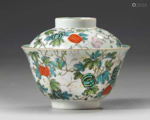 A CHINESE FAMILLE ROSE 'BUTTERFLY AND MELON' BOWL …