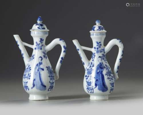 A PAIR OF CHINESE BLUE AND WHITE MOULDED EWERS AND…