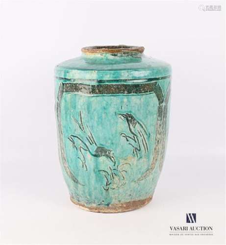 Turquoise glazed terracotta vase decorated with bi…
