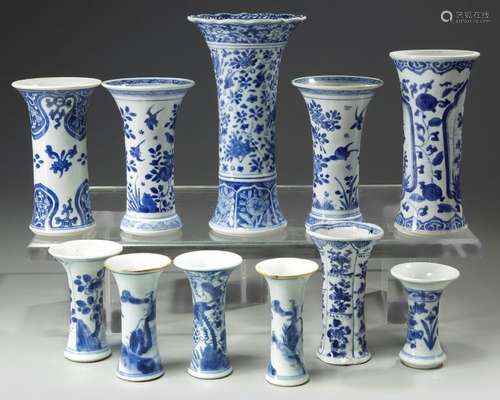 A GROUP OF TEN CHINESE BLUE AND WHITE BEAKER VASES