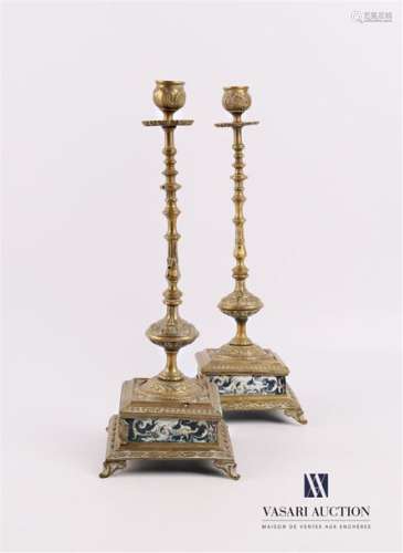 Pair of bronze candleholders, the turned shaft res…
