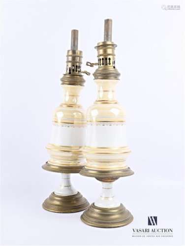 Pair of oil lamps in brass and porcelain with gild…