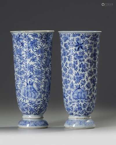 A PAIR OF CHINESE BLUE AND WHITE BEAKER VASES