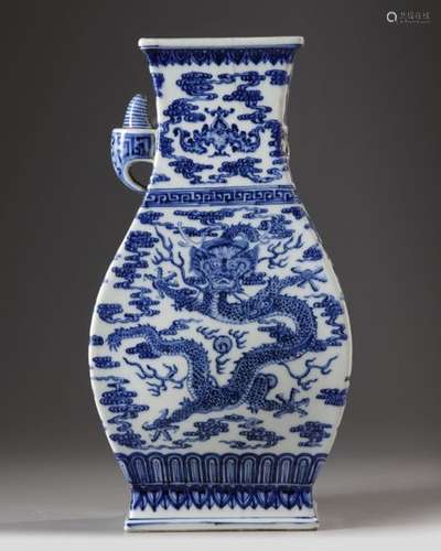 A CHINESE BLUE AND WHITE 'DRAGON & PHOENIX' VASE