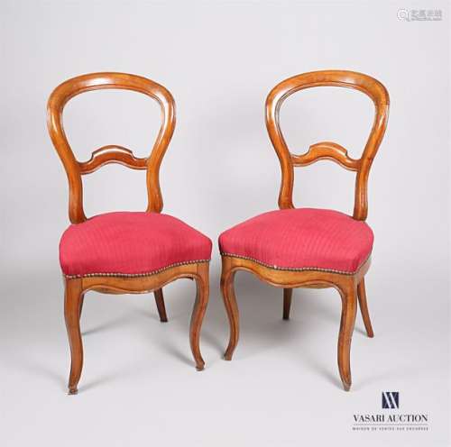 Pair of moulded natural wood chairs, the backrest …