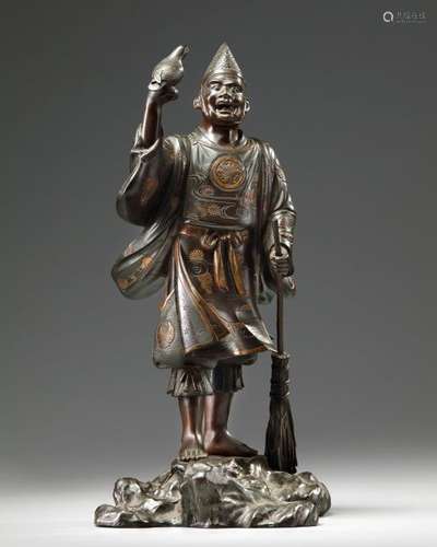 A JAPANESE BRONZE PARCEL GILT FIGURE