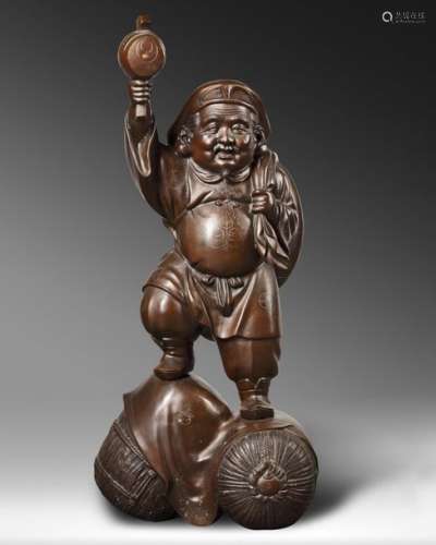 A VERY LARGE AND HEAVY JAPANESE BRONZE FIGURE OF D…