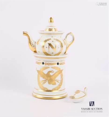 White porcelain teapot with decoration on the base…