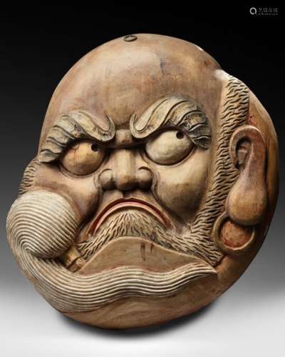 A JAPANESE WOODEN KANBAN DEPICTING AN ANGRY LOOKIN…