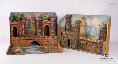 Set of two wooden and cardboard decorations depict…