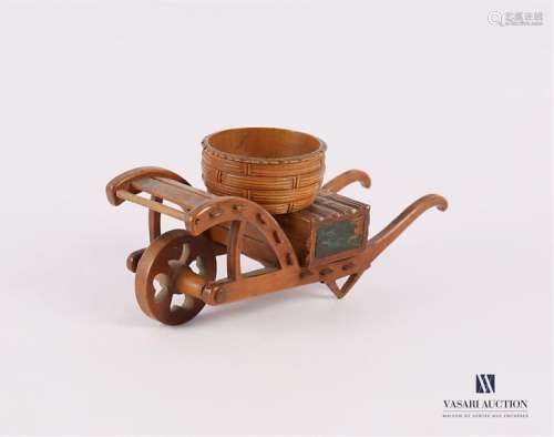 Matchbox in the shape of a wooden wheelbarrow, the…