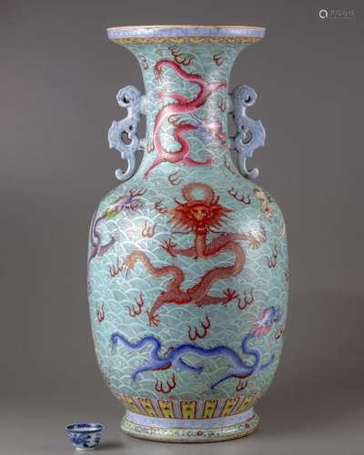 A CHINESE BLUE GROUND FAMILLE ROSE 'DRAGONS' VASE