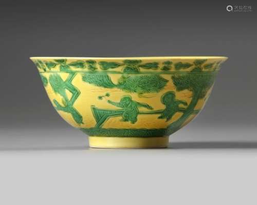 A CHINESE YELLOW GROUND GREEN GLAZED 'BOYS' BOWL