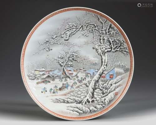 A CHINESE FAMILLE ROSE 'SNOWY LANDSCAPE' DISH